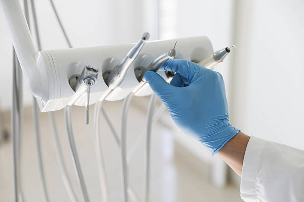 Professional Wisdom Tooth Removal technician working in Mastic, NY